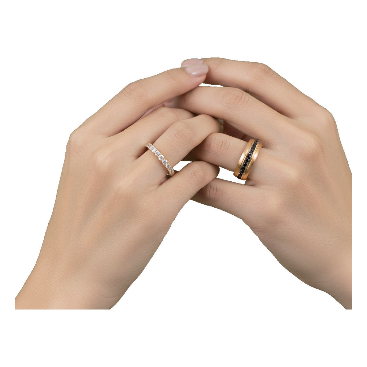 Yellow gold couple rings on hands